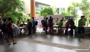 Students visiting the exhibition booths.